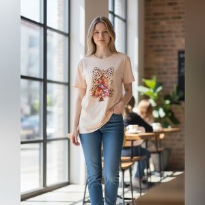 Peach Graphic T-Shirt with Bow Design